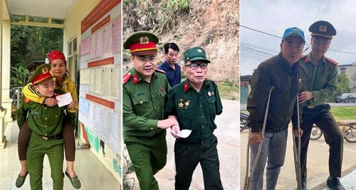 Cán bộ, chiến sĩ Công an hỗ trợ cử tri cao tuổi, đi lại khó khăn đến điểm bỏ phiếu thực hiện quyền và nghĩa vụ công dân trong Ngày bầu cử
