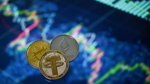 Hình ảnh minh họa đồng tiền điện tử Tether, Bitcoin và Ethereum. Ảnh: Getty Images