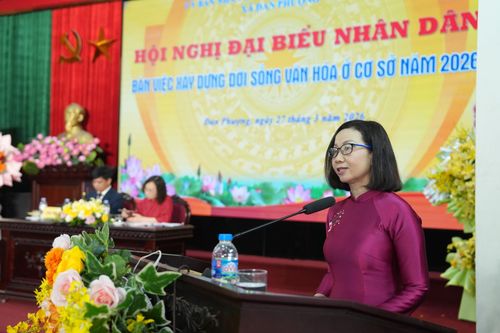Phó Bí thư Thường trực Đảng ủy xã Đan Phượng Nguyễn Thị Hiền phát biểu tại hội nghị. Ảnh: Thiên Tú