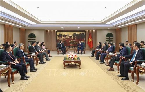Thủ tướng Phạm Minh Chính tiếp Đại sứ Trung Quốc tại Việt Nam Hà Vĩ. Ảnh: Dương Giang/TTXVN