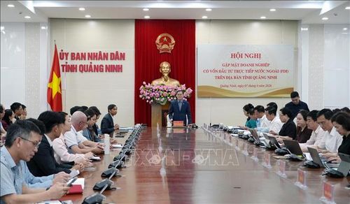 Hội nghị gặp mặt các doanh nghiệp có vốn đầu tư trực tiếp nước ngoài (FDI) trên địa bàn tỉnh Quảng Ninh. Ảnh: Văn Đức/TTXVN