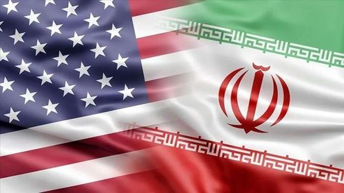 Quốc kỳ Mỹ và quốc kỳ Iran. Ảnh minh họa: Anadolu Agency