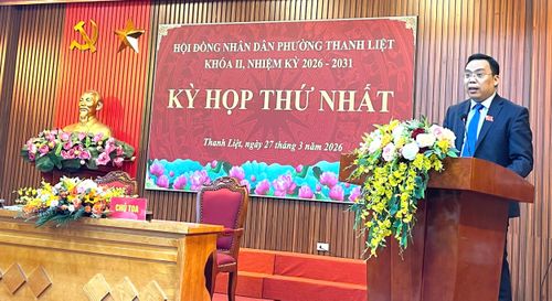 Bí thư Đảng ủy - Chủ tịch HĐND phường Thanh Liệt Nguyễn Minh Tuân phát biểu tại kỳ họp thứ nhất HĐND phường khóa 2 nhiệm kỳ 2026- 2031. Ảnh: Kim Xuyến