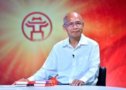 Tiến sĩ Nguyễn Mạnh Hùng trả lời tại chương trình. Ảnh: Viết Thành