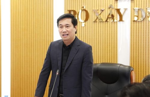 Thứ trưởng Bộ Xây dựng Nguyễn Tường Văn chủ trì hội thảo.