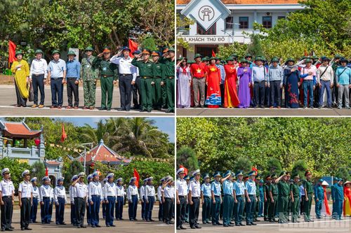 Dưới cờ đỏ sao vàng của Tổ quốc, các thành viên trong đoàn công tác cùng cán bộ, chiến sĩ và nhân dân trên đảo Trường Sa thực hiện nghi lễ chào cờ và hát Quốc ca.