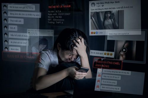 Hình ảnh: Trẻ bị bắt nạt trên mạng bị phát tán thông tin cá nhân hoặc hình ảnh riêng tư, dẫn đến khủng hoảng tâm lý nghiêm trọng