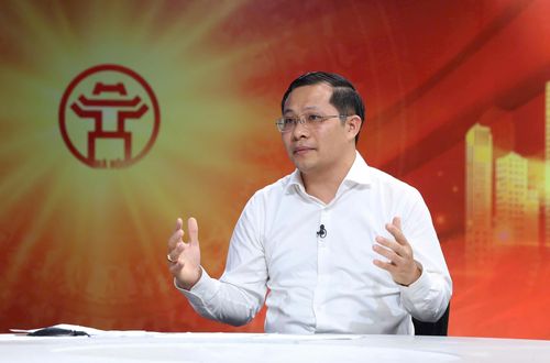 Tiến sĩ Đoàn Văn Tình, Phó Trưởng khoa Quản trị nhân lực, Học viện Hành chính và Quản trị công trao đổi tại Chương trình. Ảnh: Thanh Hải