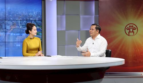 Tiến sĩ Đoàn Văn Tình, Phó Trưởng khoa Quản trị nhân lực, Học viện Hành chính và Quản trị công trao đổi tại Chương trình. Ảnh: Thanh Hải