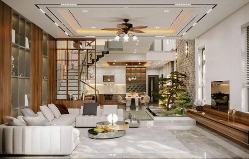 Cách thức kết hợp hài hòa giữa việc chọn ốp gỗ tường tivi, tone- sur- tone cùng với bộ bàn ghế sofa tối màu tạo ra được mức độ sang trọng và hài hòa.