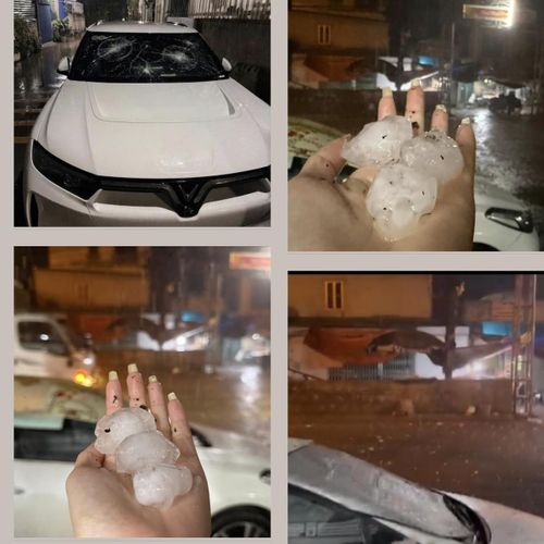 Mưa đá bất ngờ rơi xuống, gây hư hỏng nhiều kính ô tô. Ảnh NDCC