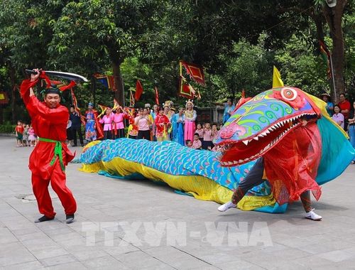 Đặc sắc múa Giảo long. Ảnh: Khánh Hòa - TTXVN