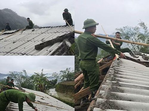 Công an xã Bản Máy hỗ trợ một số hộ dân khẩn trương khắc phục hậu quả do giông lốc, mưa lớn và dọn dẹp cây cối gãy đổ.