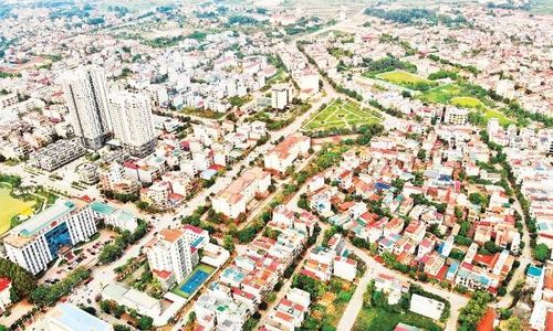  Xây dựng cơ sở dữ liệu đất đai góp phần tạo nền tảng quản lý hiện đại, minh bạch. Ảnh: Một góc đô thị phường Bắc Giang nhìn từ trên cao. 