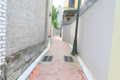 Tuyến ngõ tại thôn Lại Đà được mở rộng, kết nối hai trục đường chính trong thôn sau sự đồng thuận và chung tay của nhiều hộ dân địa phương. Ảnh:MK