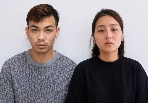 Nguyễn Minh Hiệp và Bàn Thị Tâm tại cơ quan Công an.