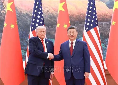 Chủ tịch Trung Quốc Tập Cận Bình và Tổng thống Mỹ Donald Trump tại cuộc hội đàm ở Bắc Kinh ngày 14-5. Ảnh: THX/TTXVN