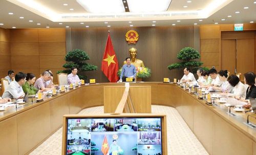 Phó Thủ tướng Hồ Quốc Dũng chủ trì Hội nghị về tình hình quản lý vùng trồng, cơ sở đóng gói và công tác kiểm nghiệm nông sản xuất khẩu. Ảnh: VGP/Gia Huy