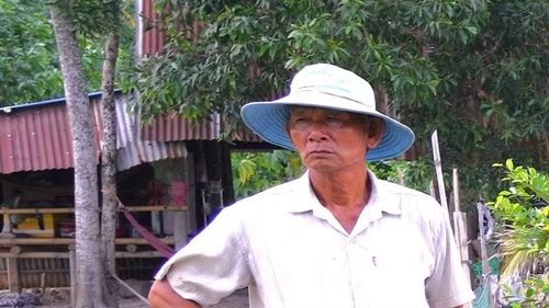 Ông Nguyễn Văn Đây nhìn dòng nước sông Vàm Cỏ Đông không chỉ là mùi hôi hay màu nước đen ngòm mà là cảm giác bất lực.
