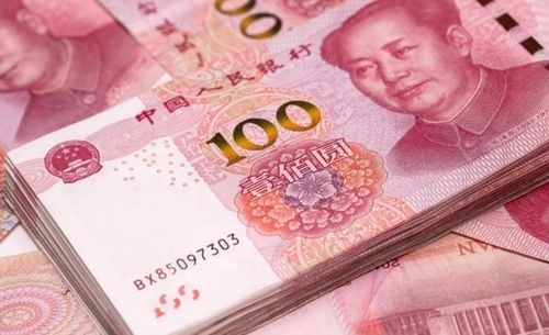 Đồng Nhân dân tệ đang lưu hành cả tiền giấy và tiền xu. (Ảnh: SCMP)