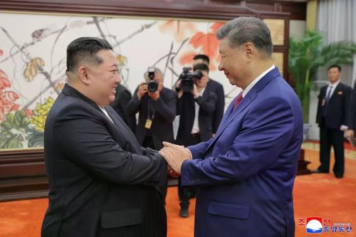 Chủ tịch Trung Quốc Tập Cận Bình và Chủ tịch Triều Tiên Kim Jong Un. (Ảnh: AP)