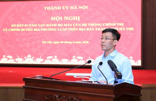 Giám đốc Sở Khoa học và Công nghệ Cù Ngọc Trang trình bày tham luận tại hội nghị. Ảnh: Quang Thái