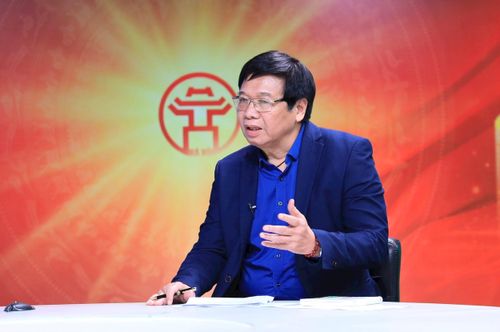 TS Nguyễn Quang, nguyên Giám đốc Chương trình UN-Habitat Việt Nam. Ảnh: Quang Thái
