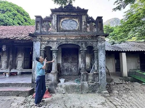 Ngôi nhà hơn 80 tuổi của gia đình anh Nguyễn Văn Khoái.