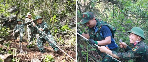 Cán bộ, chiến sĩ sử dụng dây chuyên dụng tiếp cận những vị trí vực sâu, nơi nghi có hài cốt liệt sĩ.
