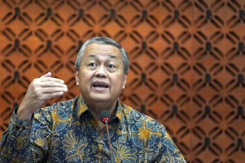 Thống đốc BI Perry Warjiyo - Ảnh: Bloomberg