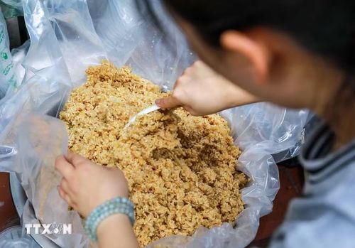Rượu nếp - thức quà không thể thiếu trong ngày tết Đoan Ngọ. (Ảnh: Khánh Hòa/TTXVN)