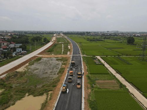 Các nhà thầu tăng tốc thi công Vành đai 4 - Vùng Thủ đô. Ảnh: Phạm Công