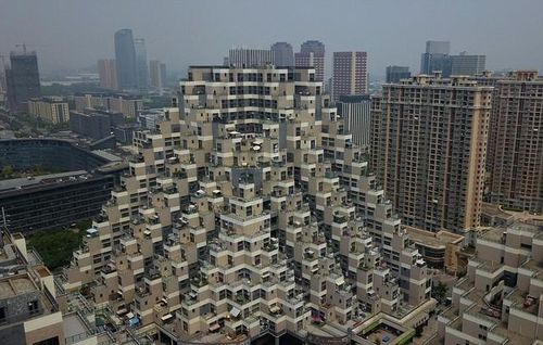 Tòa chung cư 18 tầng hình kim tự tháp độc đáo. Ảnh: Masters' Architectural Office.
