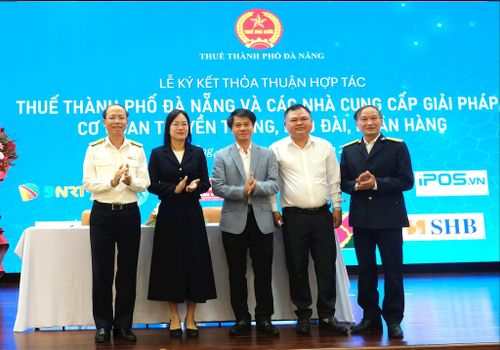 Thuế Thành phố ký kết hợp tác với các cơ quan báo chí, truyền thông. Ảnh: NGỌC HÀ