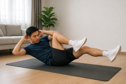 Gập bụng đạp xe kết hợp gập thân và xoay người, giúp tăng hoạt động của cơ bụng chéo trong và ngoài.