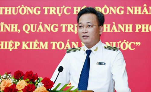 Đồng chí Nguyễn Hữu Nghĩa, Tổng Kiểm toán Nhà nước phát biểu tại hội nghị - Ảnh: X.P