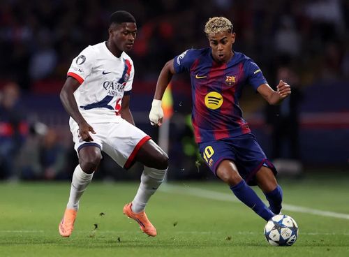 Lamine Yamal (phải) và Nuno Mendes trong màu áo CLB tại UEFA Champions League 2025/26. Ảnh: Getty Images