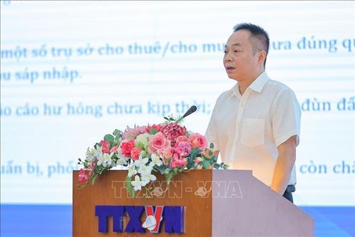 Đồng chí Ngô Thanh Sơn, Chánh Văn phòng TTXVN trình bày tham luận. Ảnh: Lê Đông/TTXVN