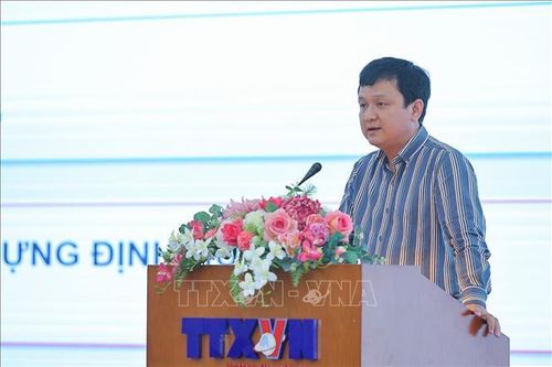 Đồng chí Nguyễn Đức Vũ, Giám đốc Trung tâm kỹ thuật thông tấn trình bày tham luận. Ảnh: Lê Đông/TTXVN.