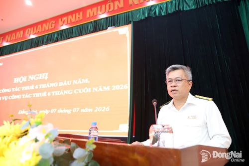 Trưởng Thuế thành phố Đồng Nai Nguyễn Toàn Thắng báo cáo tại hội nghị. Ảnh: B.Nguyên