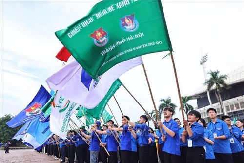Các đội hình tình nguyện tại lễ xuất quân về các địa bàn để thực hiện nhiệm vụ. Ảnh: Minh Đức/ TTXVN