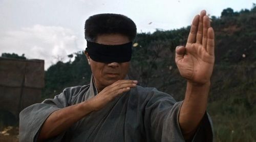 Vai diễn Trần Chân trong Tinh Võ Anh Hùng (1994) ghi dấu ấn sâu đậm nhờ những trận giao đấu đối kháng chân thực với tốc độ cao. Ảnh: NSX