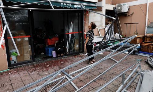 Một số thiệt hại do bão Ba Vì gây ra ở Trung Quốc - Ảnh: Reuters