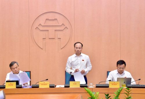 Các đại biểu HĐND thành phố Hà Nội thảo luận tại Tổ chiều 14/7