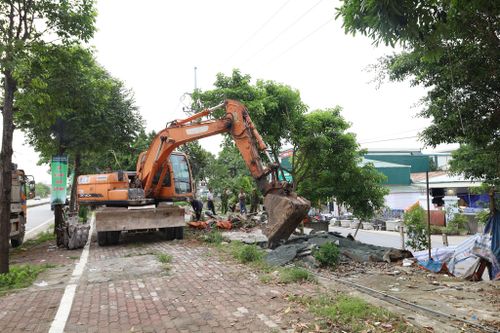 Sau giải tỏa hàng quán lấn chiếm hành lang quốc lộ 6, phường Chương Mỹ sẽ đầu tư công trình, vừa tạo điểm nhấn cảnh quan đô thị, chống tái lấn chiếm. Ảnh: Kim Nhuệ