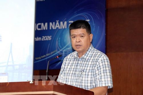 Phó Giám đốc Sở Xây dựng TP. Hồ Chí Minh Bùi Hòa An trao đổi tại buổi tập huấn. Ảnh: Tiến Lực - TTXVN