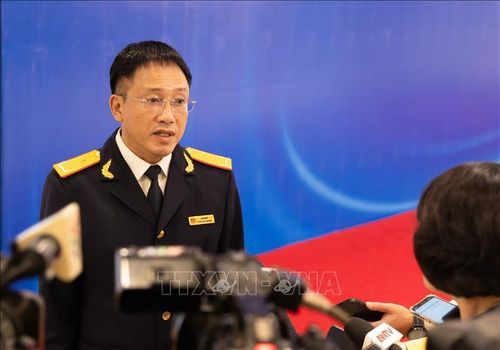 Phó cục trưởng Cục Thuế Mai Sơn trả lời phỏng vấn bên lề Hội nghị chiều 20/7. Ảnh: Tiến Long/TTXVN.