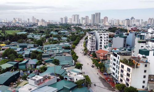 Dự thảo Luật Đất đai (sửa đổi) đề xuất bổ sung trường hợp thửa đất đã có thông báo thu hồi đất còn hiệu lực sẽ không được cấp sổ đỏ. Ảnh: Đình Phong.
