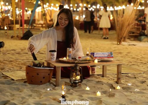 Tự tay nướng bắp, khoai, thưởng thức thêm vài món đặc sản Đà Nẵng như mực khô, cá rim.