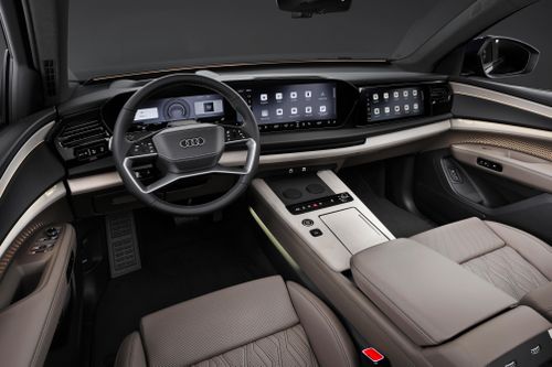 Nội thất Audi Q9 được thiết kế hiện đại với 3 màn hình gồm bảng đồng hồ kỹ thuật số Audi Virtual Cockpit 12.3 inch, màn hình cảm ứng trung tâm MMI 14.5 inch và màn hình giải trí cho hành khách phía trước 12.3 inch.